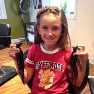 Hailey donated her hair to help make a wig for someone with cancer!